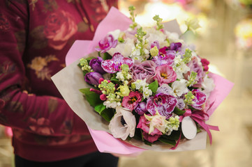 Pastel colors bouquet made of orchids, Freesia, Carnation and Limonium flowers