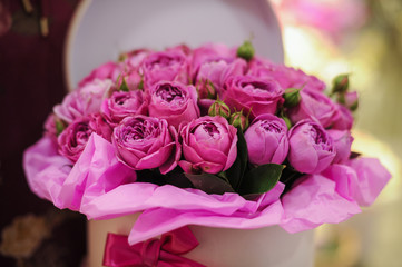 big bright pink roses bouquet in round box