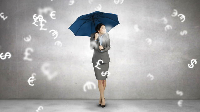 Composite image of businesswoman holding an umbrella