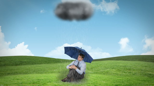 Composite animation of a businessman holding umbrella