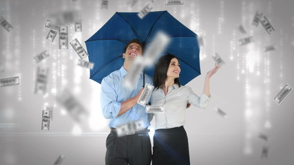 Business people standing under umbrella - Powered by Adobe
