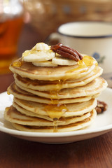 Buttermilk pancakes with banana and pecan