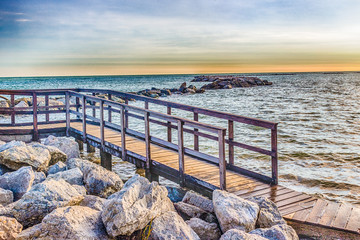 wooden walkway on the rocks