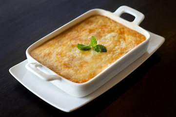 gratin in dishware