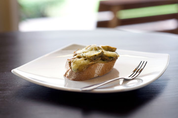 bruschetta mushrooms and cheese on bread