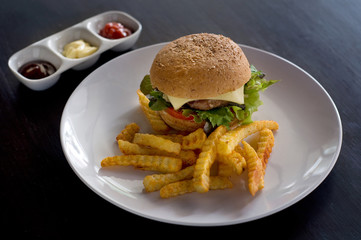 burger and fries with ketchup