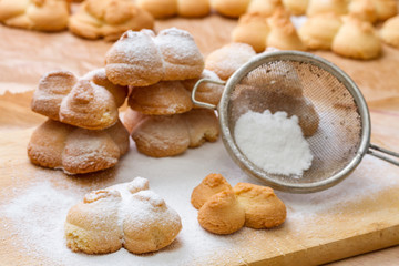 Shortbread cookies covered with powered sugar