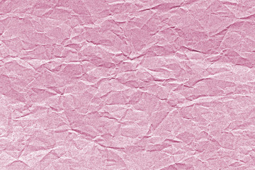 Old crumpled paper in pink tone