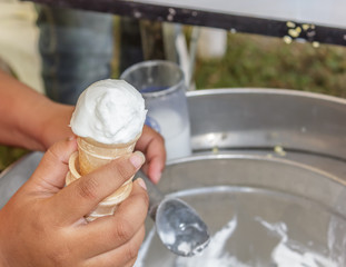Fototapeta na wymiar Ice cream in hand