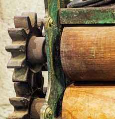 The pinion gear with wheel of old mechanical  device