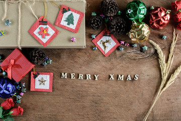 Brown gift box and decoration on old wooden background, Christma