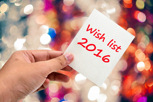 Wish list 2016 handwriting on a sticky note