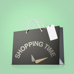 Back strong paper shopping bag with tag on green background. Shopping time concept
