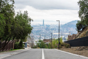 Fototapeta na wymiar View of Santiago de Chile from an urban hill