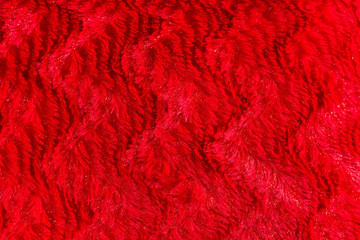 red faux fur texture background