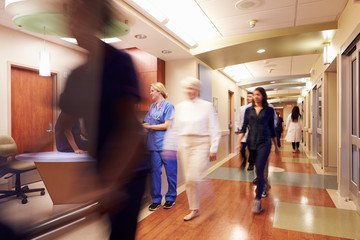 Busy Nurse's Station In Modern Hospital