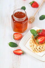 Jar of honey and waffles