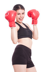 Boxer woman. Boxing fitness woman smiling happy wearing red boxing gloves on white background.
