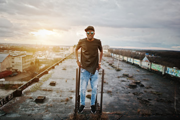 Portrait of  style black man on the roof
