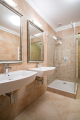 Clear and beige bathroom