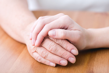 Old sick person having support