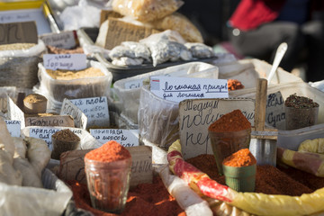Beautiful vivid oriental market with bags full of various spices