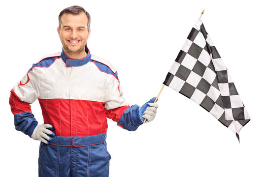 Young man waving a checkered race flag