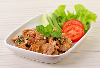 Thai food, spicy pork with chili and mint