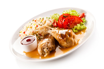 Roasted chicken drumsticks white rice and vegetables 