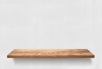 Wooden shelf on white wall