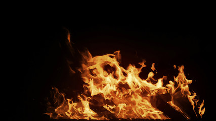 Real big shot fire with particles on black background, perfect for film, digital composition