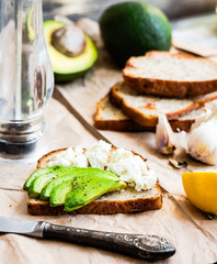 toast with fresh avocado and goat cheese, snack,selective focus