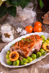 Christmas dinner with brussels sprouts in orange sauce
