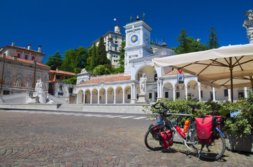 Bike parked in Piazza Libertà, Udine, Italy: riding along the Alpe Adria cycle route (Ciclovia...