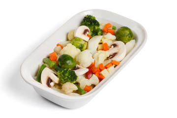 Steamed vegetables, on a white