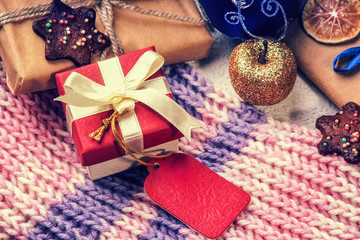 Christmas gift boxes, winter scarf and christmas ball