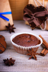 Chocolate muffin, gift boxes and heart shape