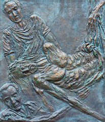Rome - The Jesus is laid in the tomb bronze relief