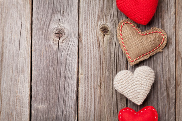 Valentines day toy hearts on wood