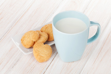 Cup of milk and heart shaped cookies