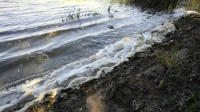 White foam pollution in the Dnieper river in Kiev