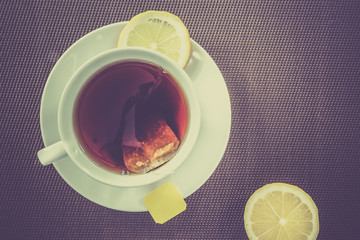 Tea cup and slice of lemon
