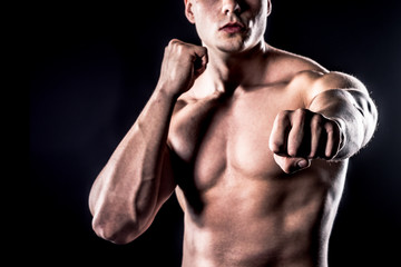 Fototapeta na wymiar Strong Man Showing Fist - Fist Punch