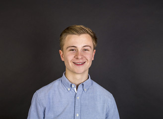 Obraz premium cute teenage boy isolated on black