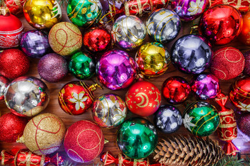 Many colored Christmas toys on a table