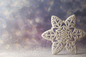Christmas decoration with fir branches on the wood background.