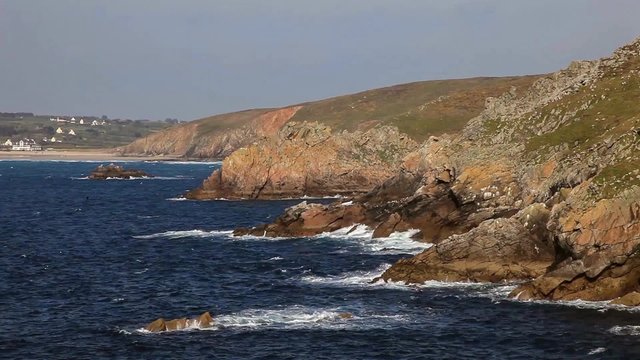 Waves crushing the rocks on Brittany coast near the Point du Raz.