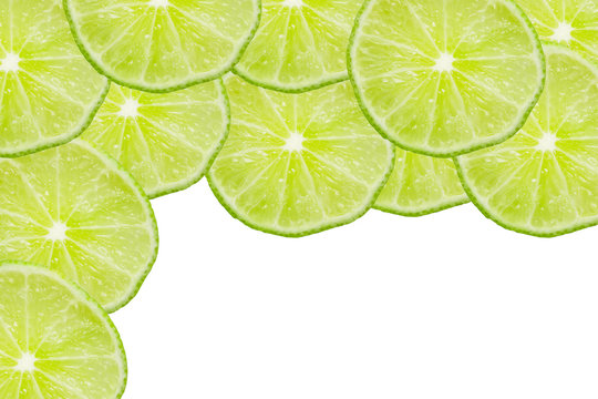 Green lime slices texture. Frame with white empty copy space.