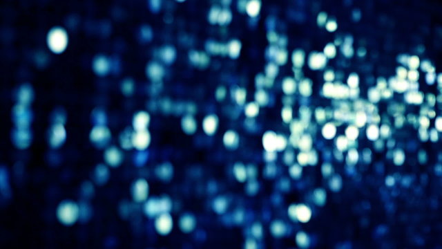 Blue, glitter and shiny bokeh lights background. Abstract sparkles