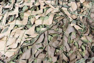 camouflage nets / Heap with camouflage nets